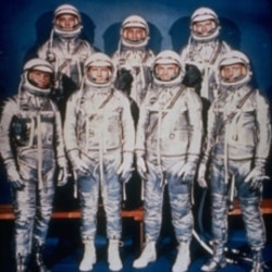 The original seven Mercury astronauts pose in their silver spacesuits in this 1961 file photo. From left, first row: Walter Schirra Jr., Donald Slayton, John Glenn and Scott Carpenter. Back Row: Alan Shepard, Jr., Virgil Grissom and Gordon Cooper
