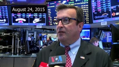 NYSE traders react to markets' decline, Aug. 24, 2015