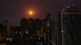 An explosion is seen in the sky over the city during a Russian drone and missile strike, amid Russia's attack on Ukraine, in Kyiv, Ukraine May 29, 2023. 