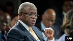FILE - Uganda's then-prime minister, Amama Mbabazi, speaks at the World Economic Forum on Africa in Cape Town, South Africa, May 9, 2013. 