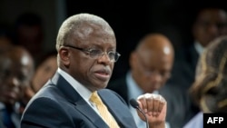 FILE - Uganda's Prime Minister Amama Mbabazi gives a speech at the World Economic Forum Meeting on Africa, Cape Town, S. Africa, May 9, 2013. 