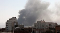 FILE - Smoke rises after Saudi-led coalition airstrikes on a target in Sana'a, Yemen, March 7, 2021. The coalition has launched a new air campaign on the war-torn country’s capital and on other provinces.