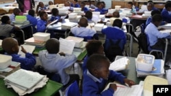 Pupils of Winnie Ngwekasi Primary School in Soweto study in a classroom in Johannesburg, South Africa, November 2009.