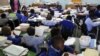 FILE - Pupils study in a classroom in Johannesburg, South Africa, November 2009.