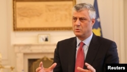 FILE - Kosovo's President Hashim Thaci gives an interview in his office in Kosovo's capital Pristina, Jan. 16, 2017. 