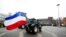 Farmers with their tractors arrive in front of the Provincial Government Office of Gelderland in Arnhem, Netherlands, on Dec. 18, 2019. 
