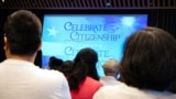 People attend a U.S. Citizenship and Immigration Services naturalization ceremony at the New York Public Library in New York on July 2, 2024.