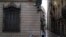 An elderly couple walks on a street, after Catalonia's regional authorities and the city council announced restrictions to contain the spread of the coronavirus disease (COVID-19) in Barcelona, Spain, July 17, 2020.