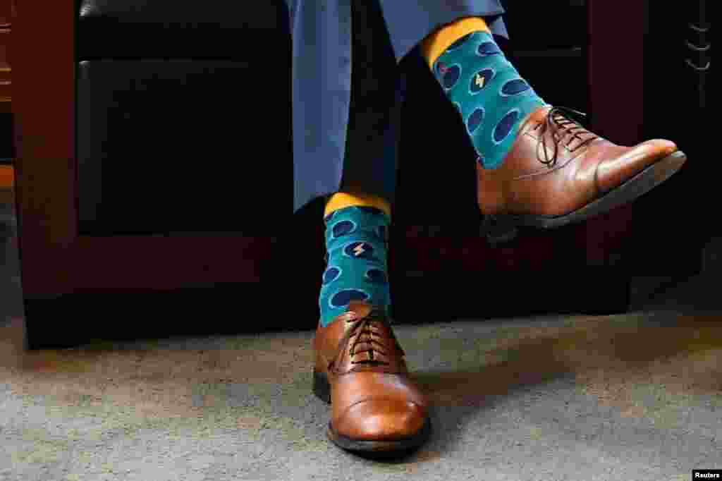 The shoes and socks of Canadian Prime Minister Justin Trudeau are seen in detail as he meets Dutch Prime Minister Mark Rutte, in The Hague, Netherlands Oct. 29, 2021.