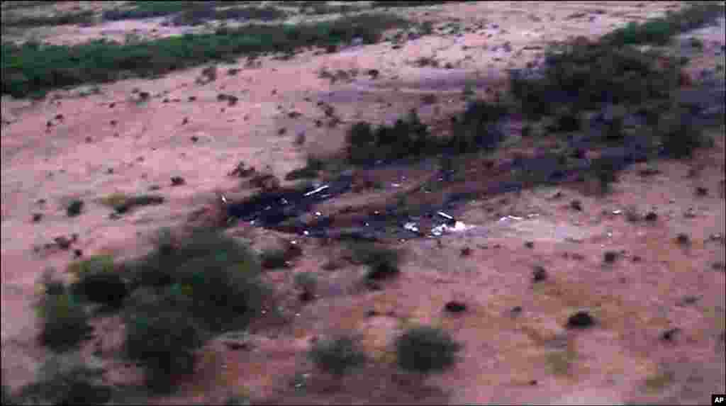 This photo provided by the French army shows the site of the Air Algerie plane crash in Mali, July 25, 2014.