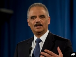 Attorney General Eric Holder discusses a 'searing report' charging the Ferguson, Mo., police department and municipal court with racial bias.