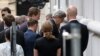 U.S. Secretary of State John Kerry, second right, arrives at Palais Coburg where closed-door nuclear talks with Iran take place in Vienna, Austria, July 8, 2015. 