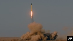 A surface-to-surface missile is launched in an undisclosed location in Iran, July 3, 2012. (photo provided by ISNA) (AP has no way of independently verify the content, location or date of this image.)
