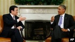 7月25日奥巴马总统在白宫会晤到访的越南国家主席张晋创