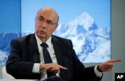 Brazil's Economy Minister Henrique Meirelles speaks during a panel discussion at the annual meeting of the World Economic Forum in Davos, Switzerland, Jan. 18, 2017.