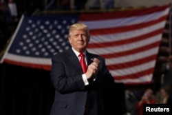 U.S. President-elect Donald Trump arrives to speak during 'thank you" tour event at Giant Center in Hershey, Pennsylvania, Dec. 15, 2016.