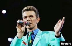 FILE - David Bowie performs on stage during The Freddie Mercury Tribute Concert at Wembley Stadium in London, Britain.
