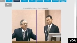 台灣國安局局長李翔宙（右）在立法院接受國民黨立委林郁方的質詢。（台灣立法院視頻截圖）