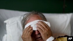 ARCHIVO - Henry Beverly, de 73 años, paciente de gripe en el Upson Regional Medical Center de Thomaston, Georgia. 9 de febrero de 2018.