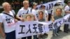 中国警察逮捕帮助工人组建工会的官方工会成员