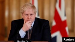 El primer ministro de Gran Bretaña, Boris Johnson en una conferencia sobre el coronavirus, el 3 de marzo de 2020.