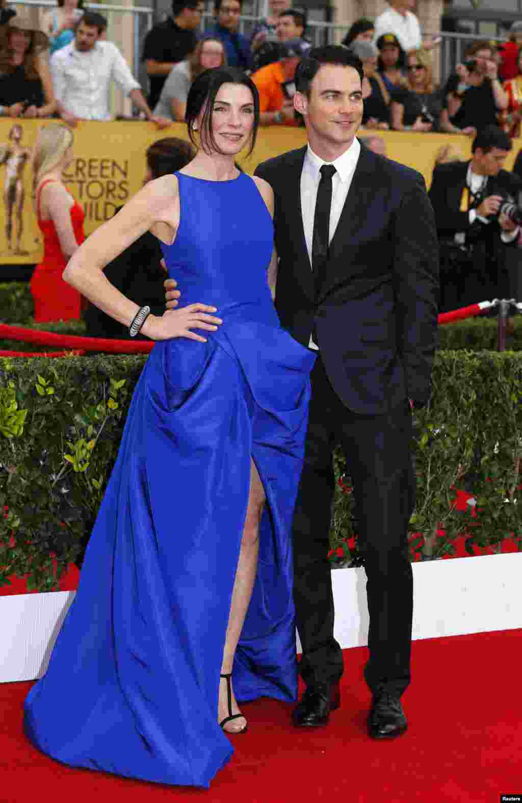 Actriz Julianna Margulies da série &quot;The Good Wife&quot; com o seu marido Keith Lieberthal na 21&ordf; cerimónia anual do Screen Actors Guild Awards, Los Angeles, Califórnia Jan 25, 2015.