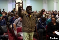 A man speaks as the Constitutional Review Committee hold public hearings regarding expropriation of land without compensation in Pietermaritzburg, South Africa, July 20, 2018.