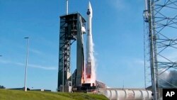 In this photo taken from video provided by NASA, Atlas V rocket lifts off from from Cape Canaveral, Florida, Aug. 18, 2017.