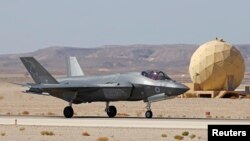 An Israeli air force F-35 fighter lands during the "Blue Flag" multinational air defence exercise at the Ovda air force base, north of the Israeli city of Eilat, on Oct. 24, 2021.