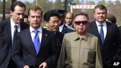 North Korean leader Kim Jong Il and Russian President Dmitry Medvedev during a meeting on a military garrison, outside Ulan-Ude, Russia, August 24, 2011