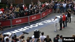 Formula One group CEO Chase Carey, Australian Grand Prix Corp. chairman Paul Little, Race director Michael Masi and Australian Grand Prix Corp. CEO Andrew Westacott announce the Australian Grand Prix would be canceled, March 13, 2020.