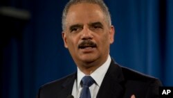 Eric Holder criticó la acción discriminadora de la policía de Ferguson.