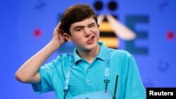 Will Lourcey, 14, of Fort Worth, Texas, contemplates a word during the 2017 Scripps National Spelling Bee at National Harbor in Oxon Hill, Md., May 31, 2017.