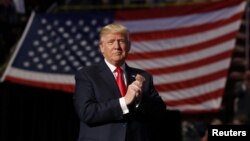 FILE - U.S. President-elect Donald Trump arrives at a thank you tour event at Giant Center in Hershey, Pennsylvania, Dec. 15, 2016.