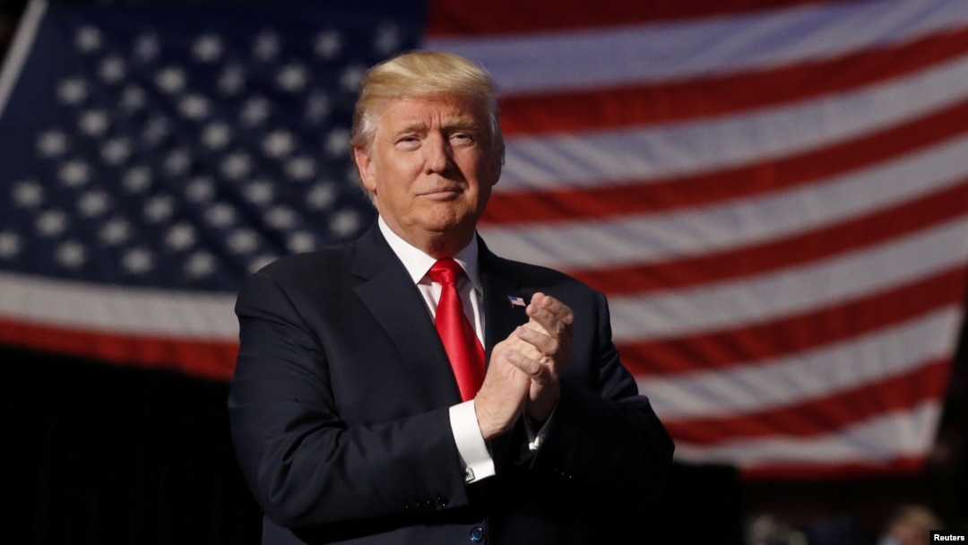 FILE - Donald Trump, at the time still President-elect, arrives to speak during a "Thank you" tour event at Giant Center in Hershey, Pennsylvania, Dec. 15, 2016.