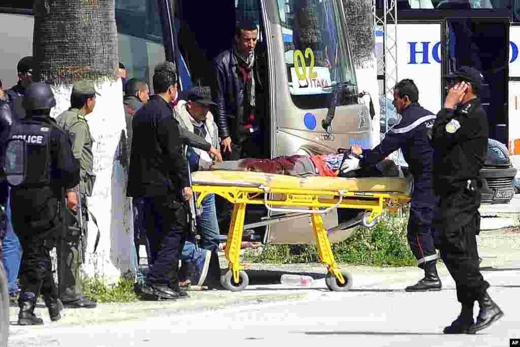 A victim is being evacuated from the Bardo Museum in Tunis, March 18, 2015.