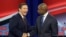 Florida Republican gubernatorial candidate Ron DeSantis, left, shakes hands with Democratic gubernatorial candidate Andrew Gillum after a CNN debate, Sunday, Oct. 21, 2018, in Tampa, Florida.