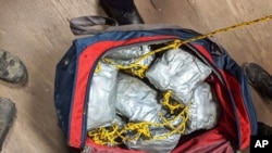 U.S. Customs and Border Protection shows some of over 165 pounds (75 kilograms) of suspected methamphetamine seized after smugglers tried to float it across the border from Nogales, Mexico. (File)