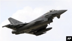 An Italian air force Eurofighter Typhoon jet takes off from the Gioia del Colle air base near Bari, Southern Italy, March 22, 2011