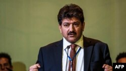 FILE - Hamid Mir, journalist and member of the jury, speaks during the Guillermo Cano World Press Freedom Prize ceremony in Addis Ababa, Ethiopia, May 2, 2019. 