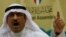 FILE - Musallam al-Barrak, who at the time was a Kuwaiti lawmaker, gestures while speaking to journalists at Parliament's media center in Kuwait City, Nov. 20, 2011. He was later jailed for criticizing an election law.