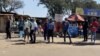 Some informal traders have started flooding the streets of Harare, May 16, 2020, to sell their wares during the coronavirus lockdown in Zimbabwe. They say they've had no source of income since the start of the lockdown in March. (Columbus Mavhunga/VOA)