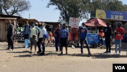 Some informal traders have started flooding the streets of Harare, May 16, 2020, to sell their wares during the coronavirus lockdown in Zimbabwe. They say they've had no source of income since the start of the lockdown in March. (Columbus Mavhunga/VOA)