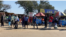 Some informal traders have started flooding the streets of Harare, May 16, 2020, to sell their wares during the coronavirus lockdown in Zimbabwe. They say they've had no source of income since the start of the lockdown in March. (Columbus Mavhunga/VOA)