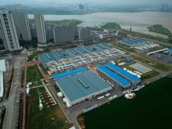 This aerial photo shows Leishenshan Hospital which was constructed in a parking lot from prefabricated modules in two weeks in Wuhan, China, April 11, 2020.