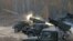 FILE - Ukrainian servicemen fire BM-21 Grad multiple rocket launcher systems during military exercises near the village of Divychky in the Kyiv region of Ukraine, Oct. 28, 2016.