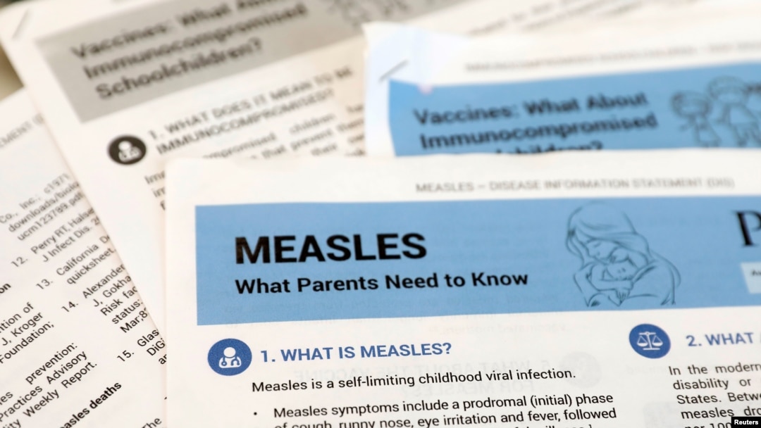 FILE PHOTO: Materials are seen left at demonstration by people opposed to childhood vaccination after officials in Rockland County, a New York City suburb, banned children not vaccinated against measles from public spaces.