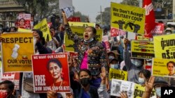 FILE - Demonstrators protest against Myanmar's military junta in Mandalay, Myanmar, Feb. 18, 2021.