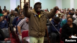 A man speaks as the Constitutional Review Committee hold public hearings regarding expropriation of land without compensation in Pietermaritzburg, South Africa, July 20, 2018. 