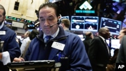 Trader Tommy Kalikas works on the floor of the New York Stock Exchange, Wednesday, Jan. 6, 2016. Stocks are opening lower as investors fret about signs of belligerence in North Korea and more weakening of China's economy.